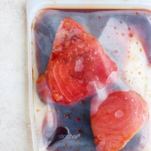 marinating tuna in marinade.