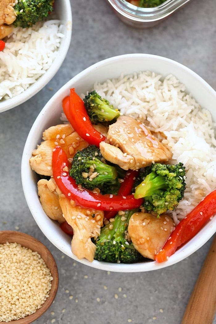 Chicken and broccoli stir fry in a bowl.