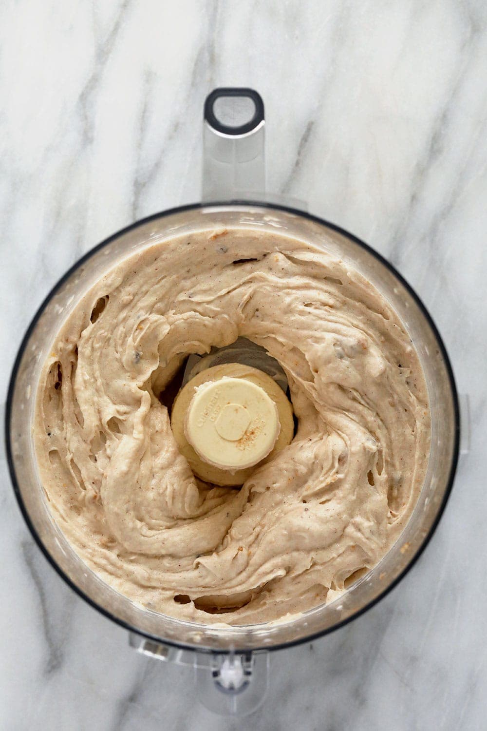 Vegan banana soft serve in a food processor 