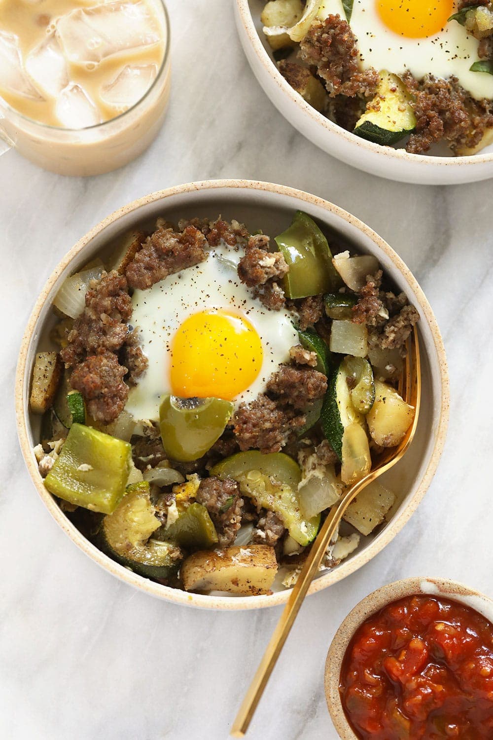 garden breakfast hash in a bowl topped with an egg