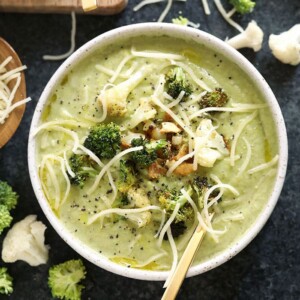 A lightened up bowl of broccoli soup with parmesan cheese.