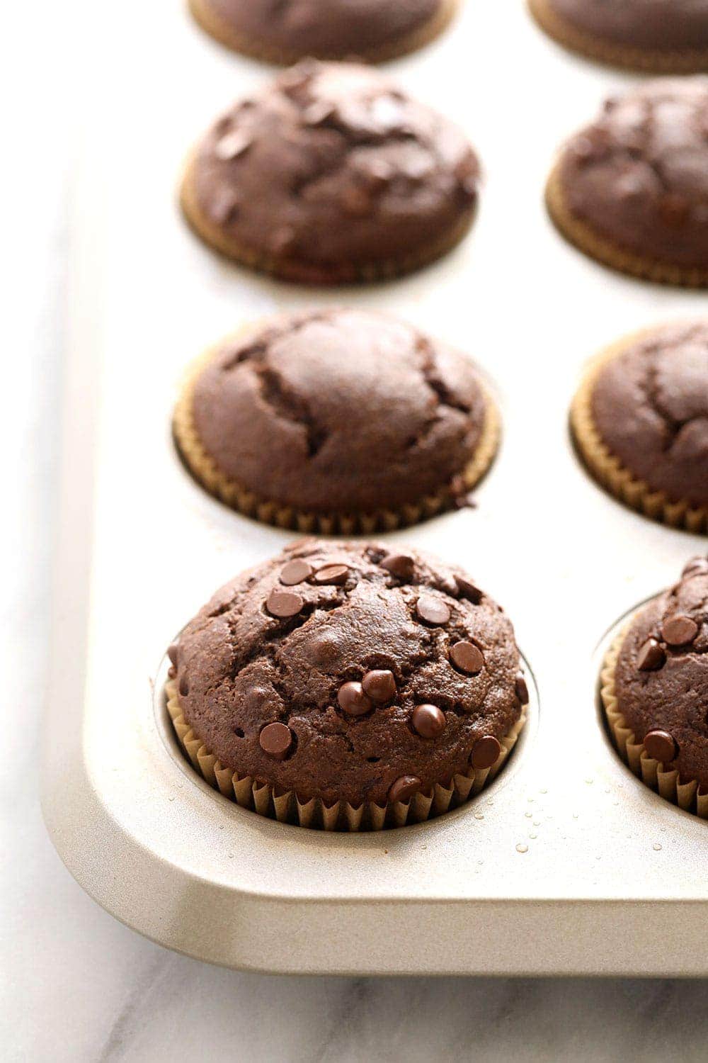 chocolate pb muffins in muffin tin