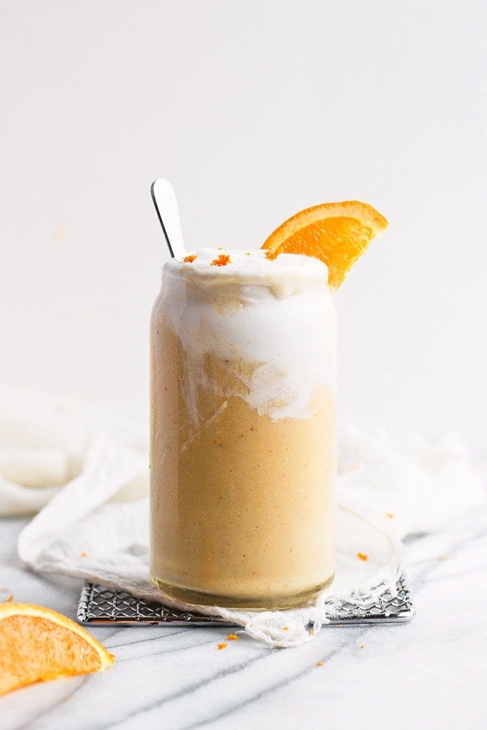 Orange smoothie with fresh orange slice