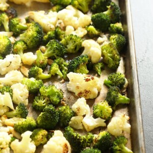 Lightened up roasted cauliflower on a baking sheet.