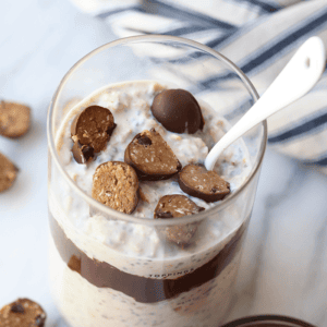 Overnight oatmeal with chocolate chips and a spoon.