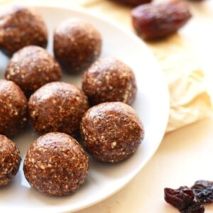 a plate full of cherry pie energy balls.