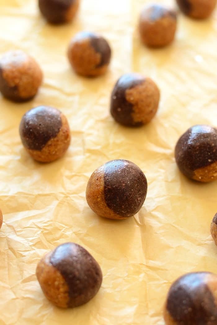 These no-bake peanut butter and jelly inspired energy balls are a healthy grab and go snack made with dried fruit and nuts!