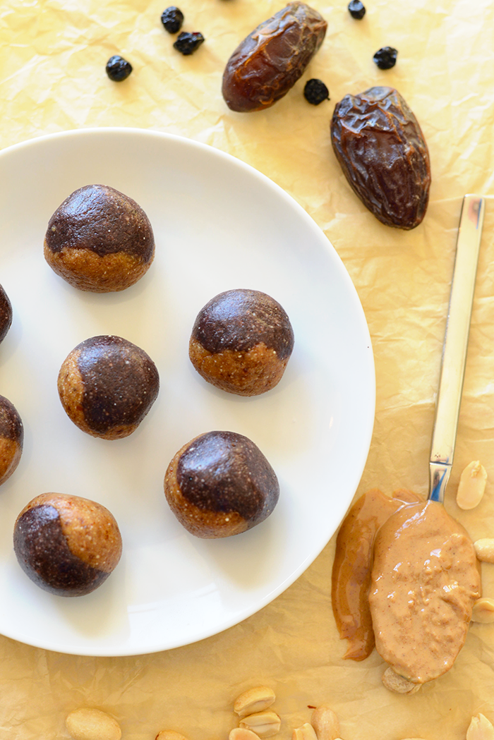 These no-bake peanut butter and jelly inspired energy balls are a healthy grab and go snack made with dried fruit and nuts!