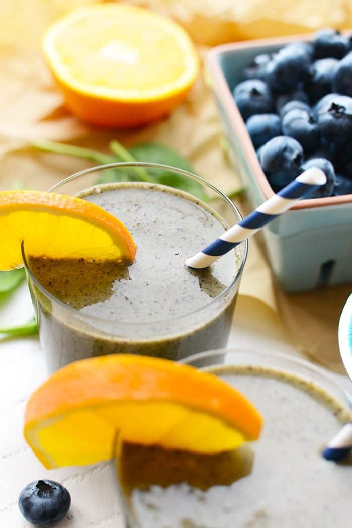 Vitamin packed smoothies in cup sitting on table 