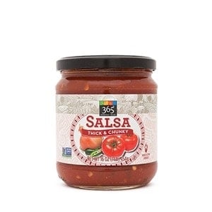 A jar of salsa, perfect for shredded chicken tacos, on a clean white background.