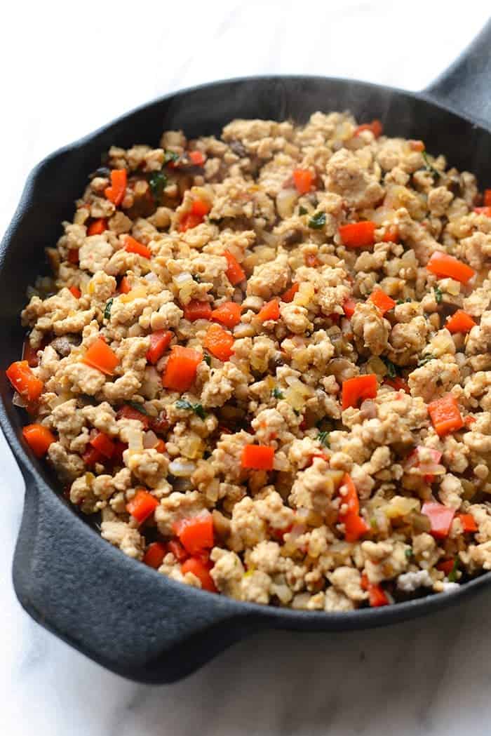 chicken and peppers in skillet for thai lettuce wraps