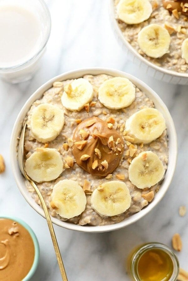 A bowl of overnight oats with peanut butter and banana slices.