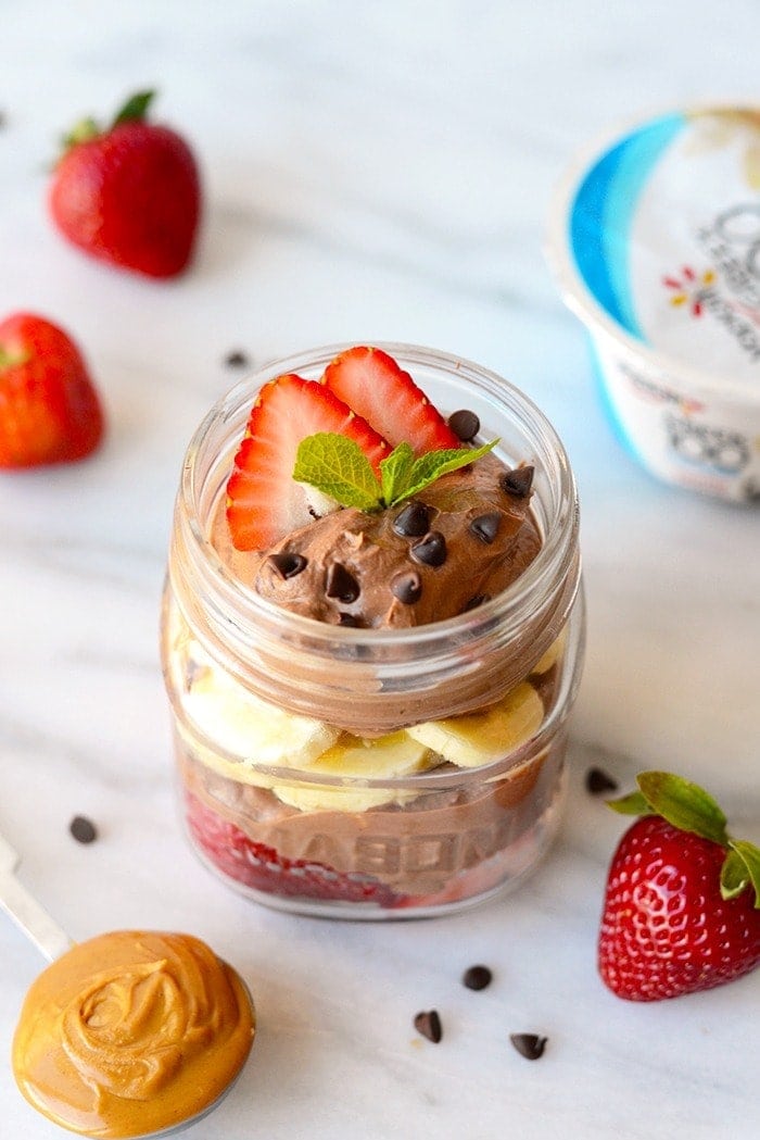 healthy chocolate peanut butter mousse parfait in a mason jar