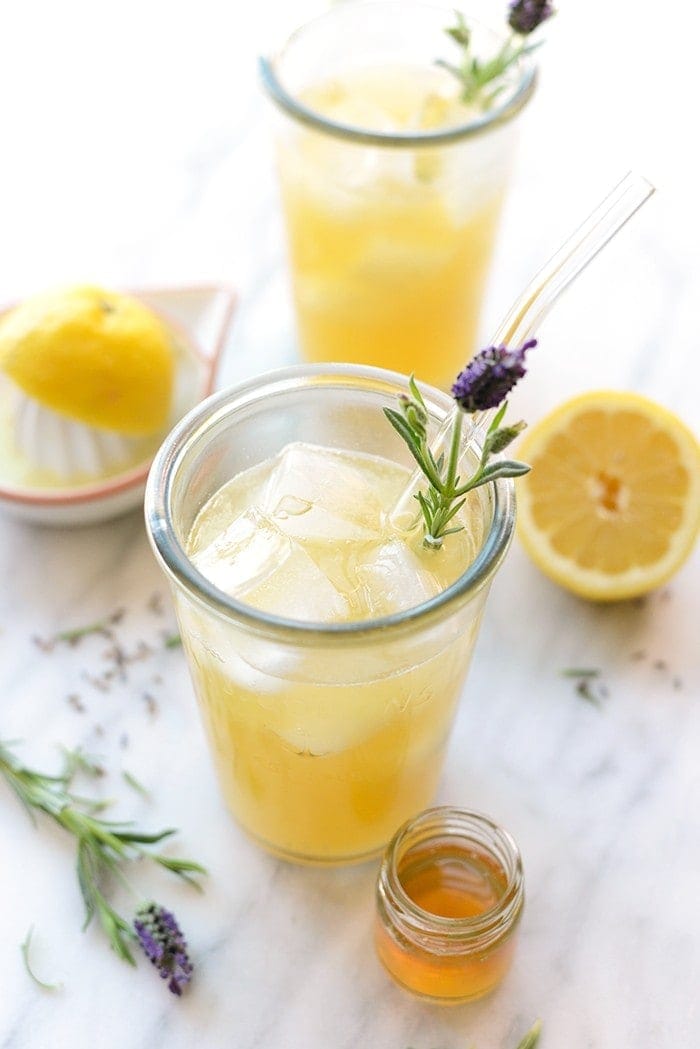 Honey Lavender Lemonade with dried lavender and small jar of honey