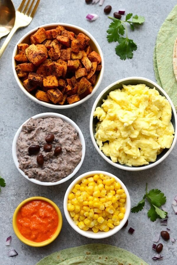 Vegetarian breakfast burrito bowls packed with black beans and tortillas.