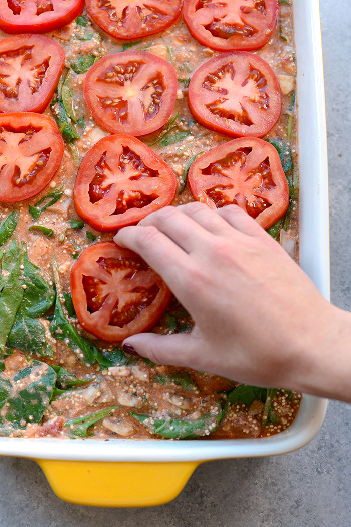 Try this lightened spinach quinoa lasagna casserole for a no-hassle, protein-packed dinner that's sans gluten and filled with so much flavor! 