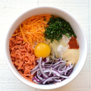 a bowl filled with cheddar hash browns for a salad.