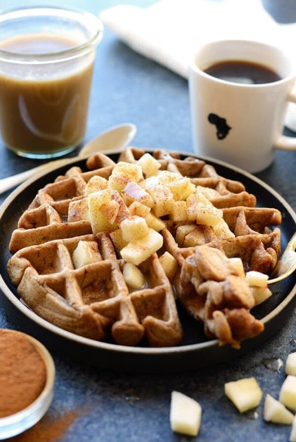 Apple cinnamon waffles on a plate.