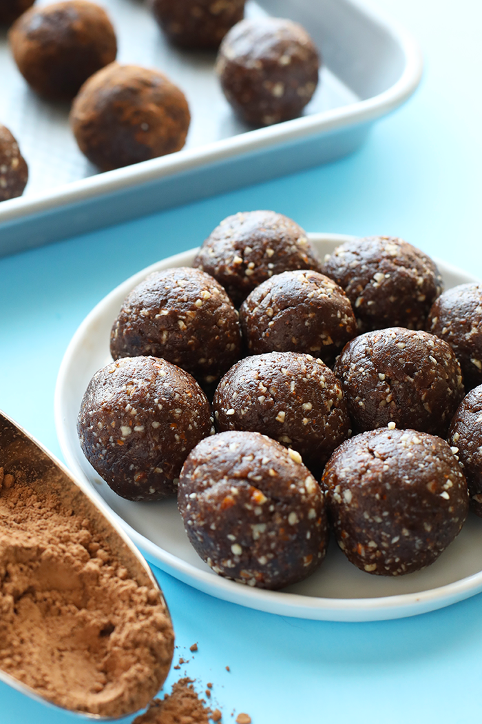 These healthy peanut butter brownie balls are the energy ball of all energy balls. They're packed with protein and fiber and pretty much taste like dessert!