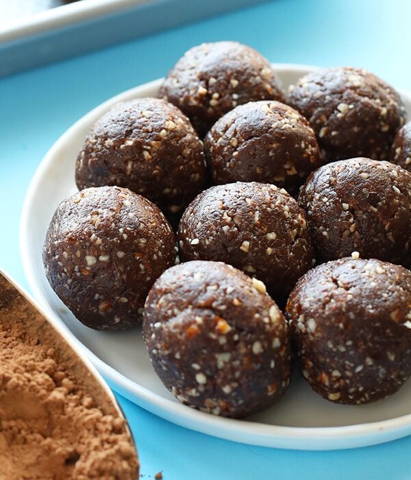 Peanut butter chocolate energy balls on a plate.