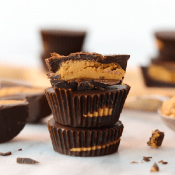 Peanut butter cups stacked on top of each other.