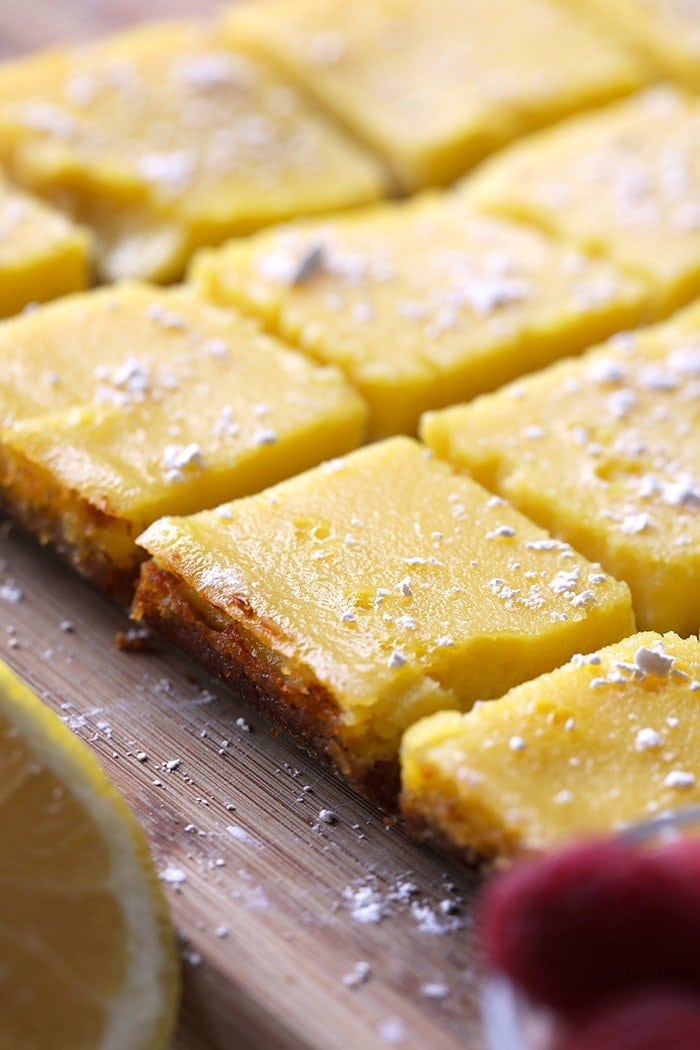 sliced healthy lemon bars with powder sugar.