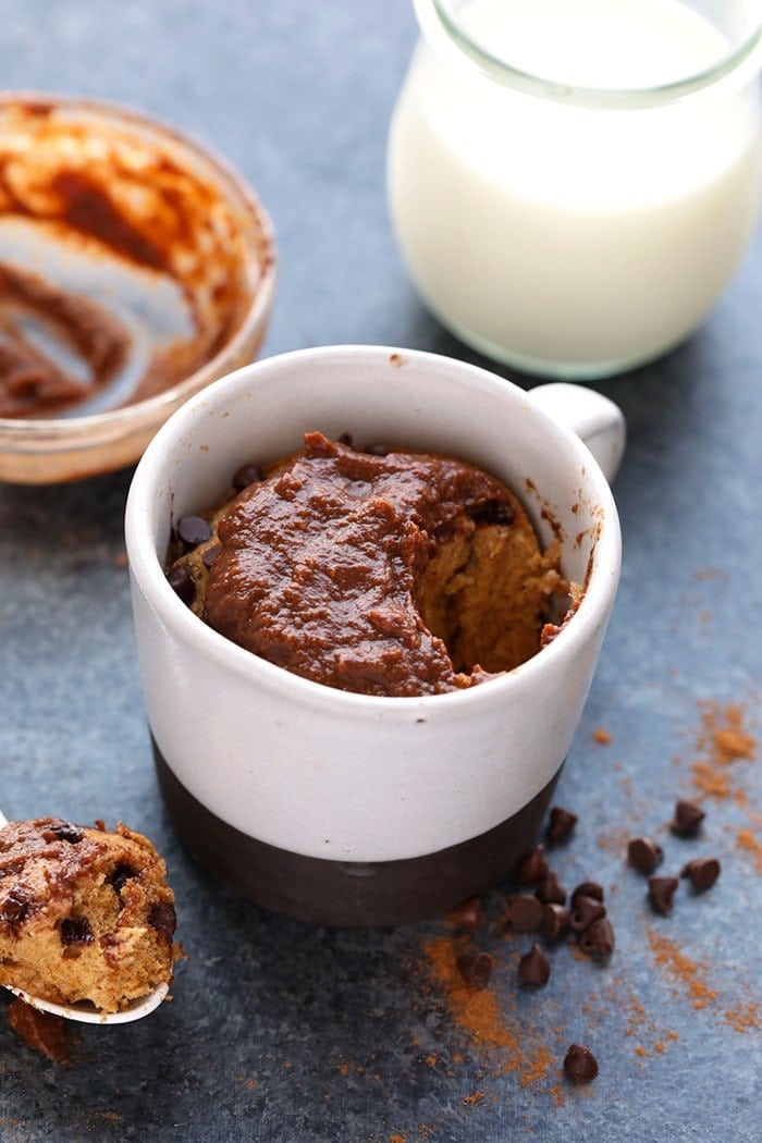 This Single-Serve Healthy Pumpkin Mug Cake with Chocolate Pumpkin Frosting is the perfect fall dessert when you just need a little something after dinner!