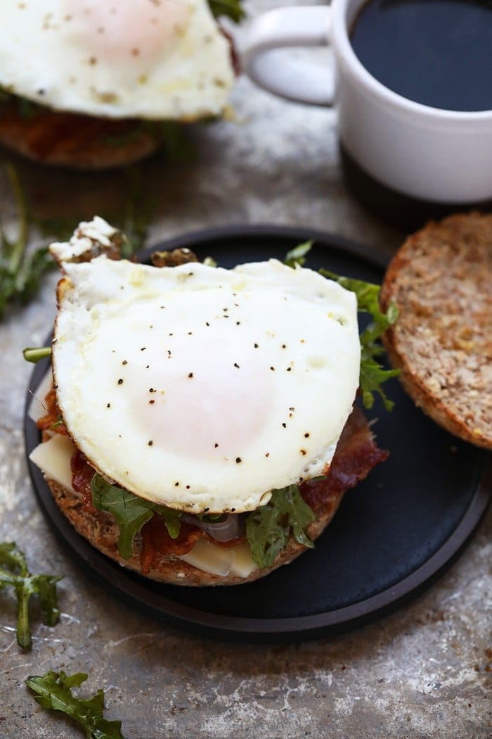 Start the morning off right with this Arugula Breakfast Sandwich with Caramelized Onions! This breakfast sandwich is a simple breakfast made with a whole grain English muffin, peppery arugula, and delicious caramelized onions that leave you with a full belly until lunch! 