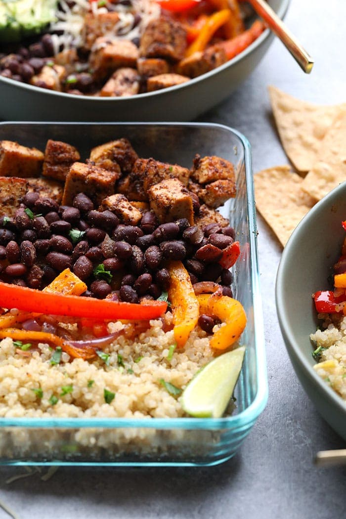 Throw all of your ingredients for this Meal Prep Sheet Pan Tofu Quinoa Burrito Bowls on a baking sheet and you've got a delicious, vegetarian meal ready for the entire week!