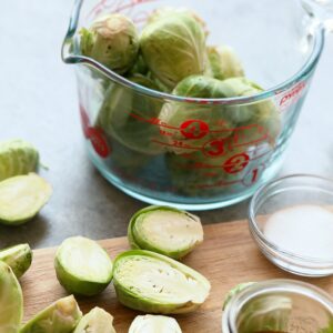 diced brussels sprouts on cutting board.