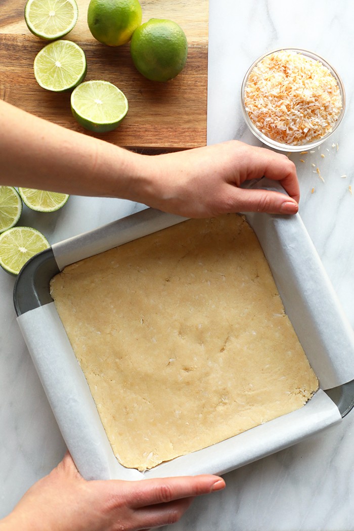 coconut pie bar crust in a pan