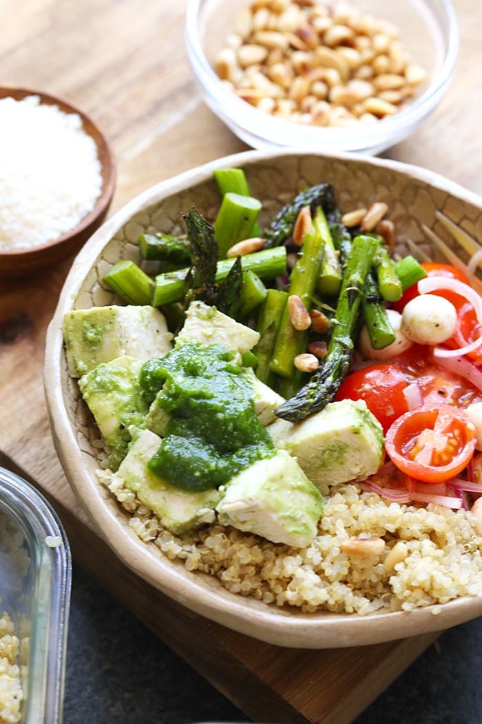 Pesto chicken and sides in a bowl ready to be eaten