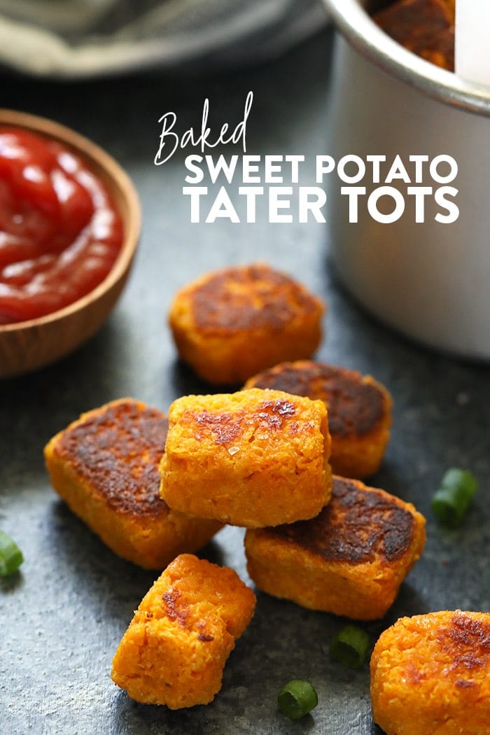 Sweet potatoes stacked on the counter.