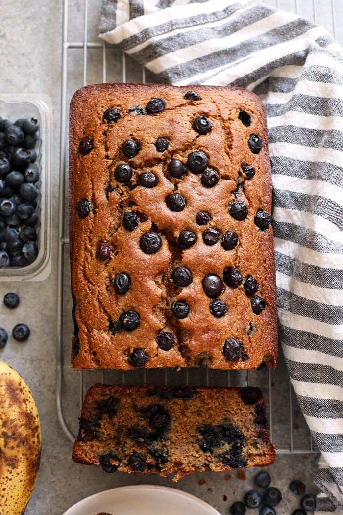 banana bread loaf on a cooling rack.