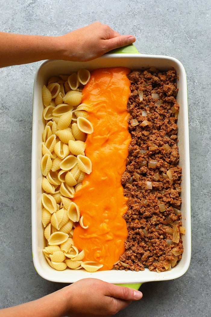 hamburger casserole ingredients in a casserole dish