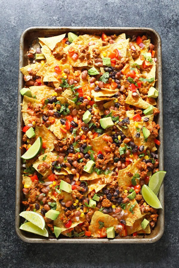 Chicken nachos on baking sheet