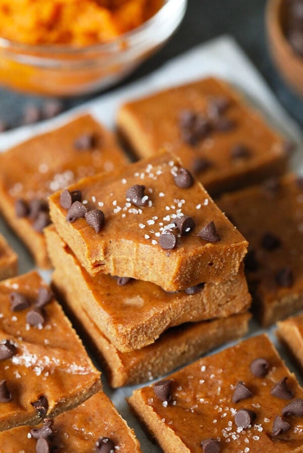 A stack of vegan sweet potato bars on a baking sheet.