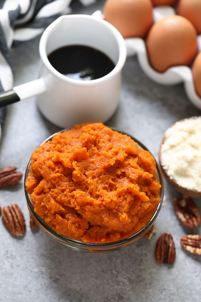 Pumpkin puree in a bowl ready to be mixed into pancake batter.