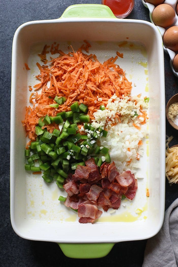 Breakfast casserole ingredients in a casserole dish