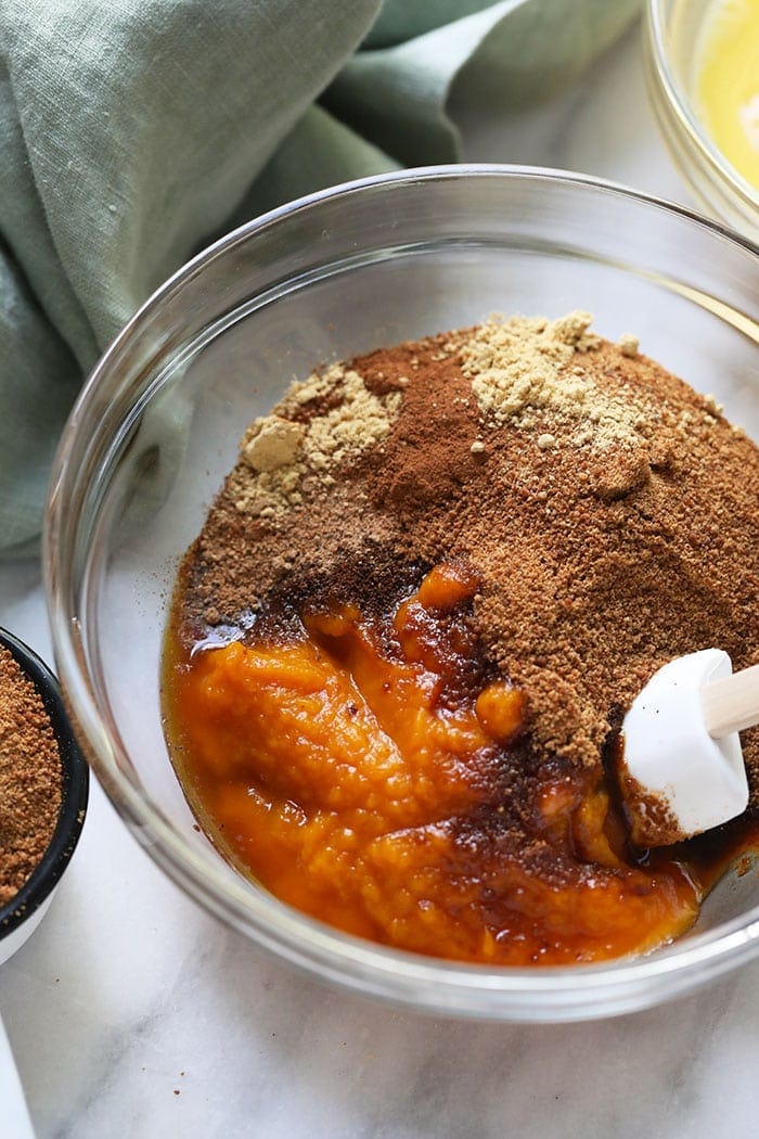 A bowl of pumpkin pie bar filling ingredients