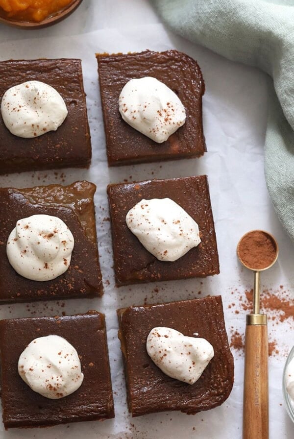 pumpkin pie bars with whipped cream topping