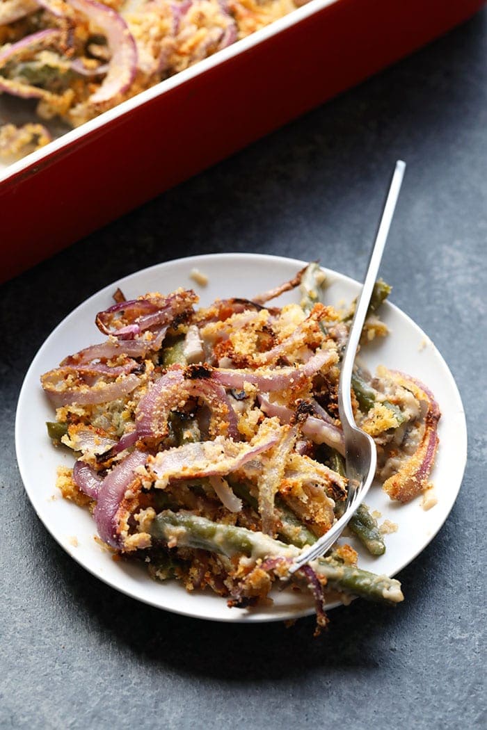 green bean casserole on plate with fork