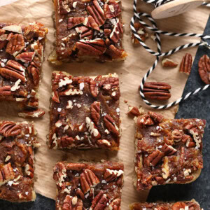 Easy pecan bars on a cutting board.