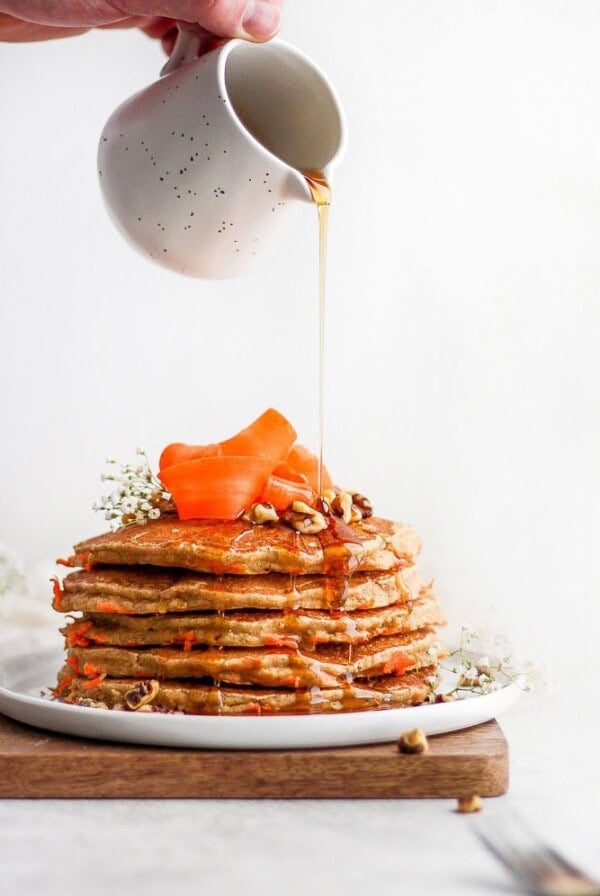 healthy carrot cake pancakes on a plate