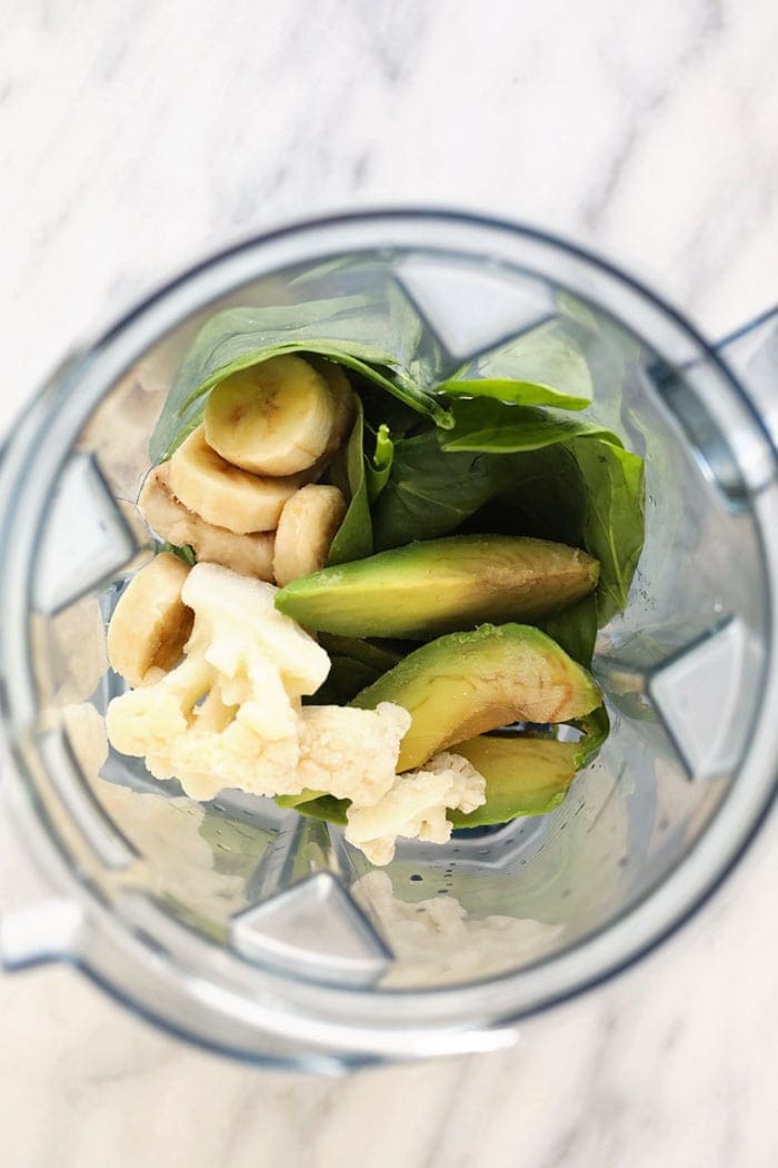 Green smoothie ingredients in a vitamix