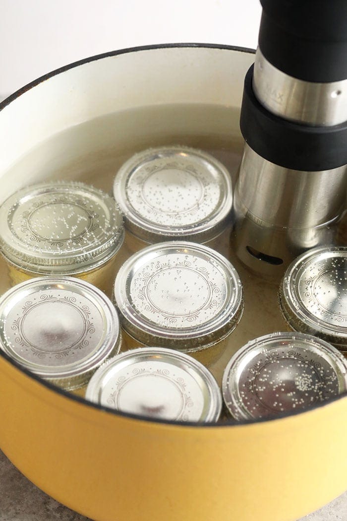 Jars in pot submerged in water