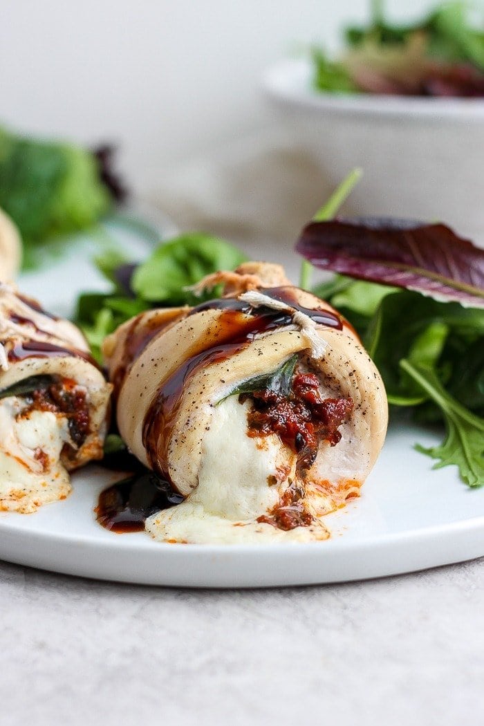 Stuffed chicken breast on a plate. 