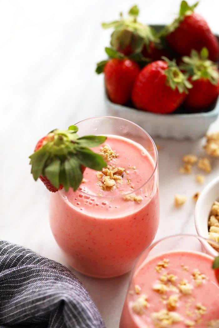 Strawberry smoothie in a cup.