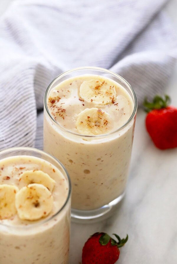 a glass of banana smoothie