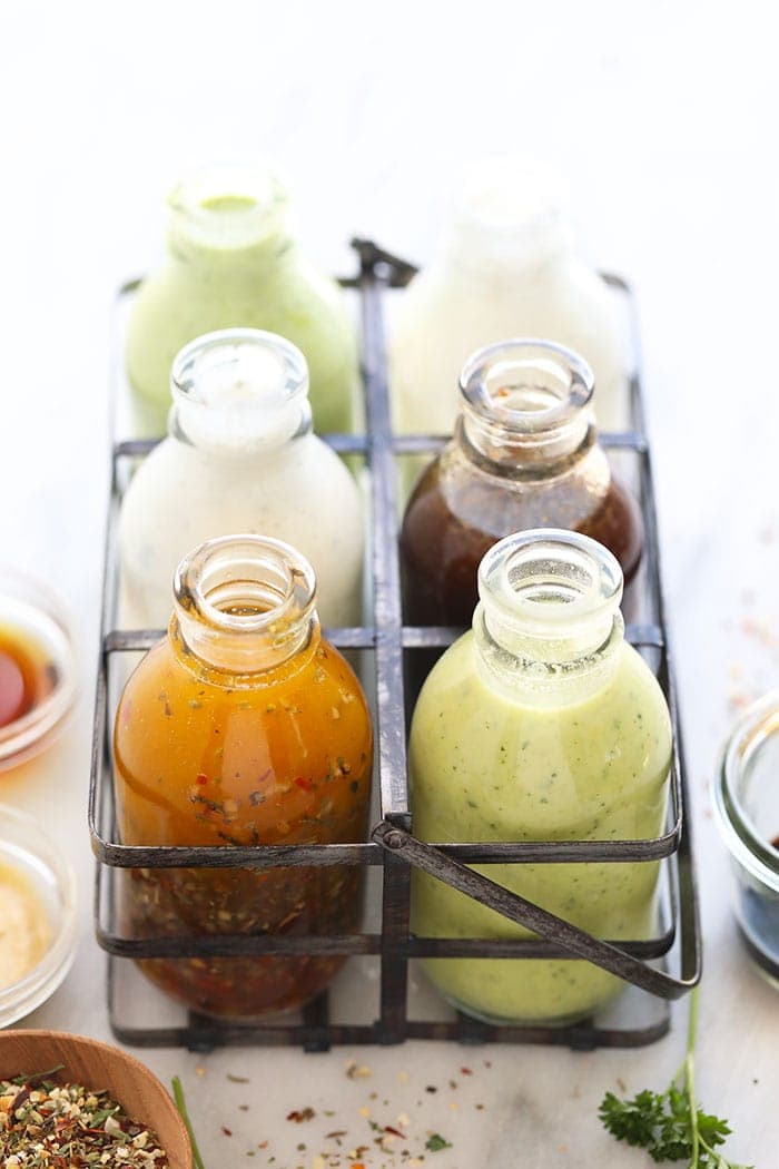 6 salad dressing recipes in a storage container